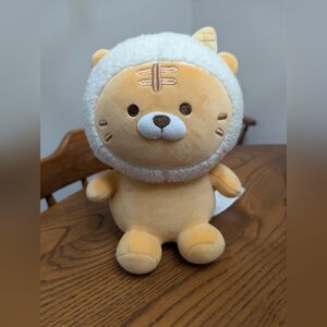 - - Miniso tiger cat. 9 inches EUC. Tan and cream. Valentine's Day ice…